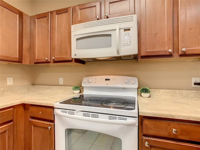 kitchen featuring white appliances