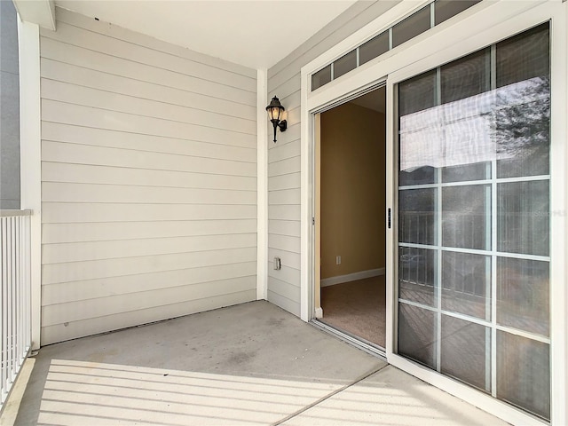 entrance to property with covered porch