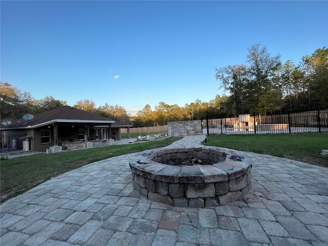 view of patio with an outdoor fire pit