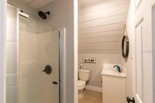 bathroom with vanity, toilet, and walk in shower