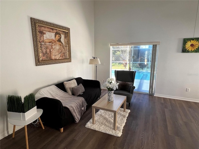 living room featuring dark hardwood / wood-style floors