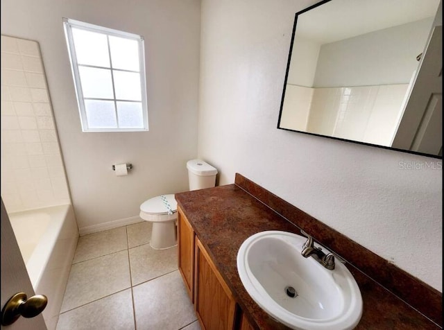 full bathroom with tile patterned floors, vanity, toilet, and bathtub / shower combination