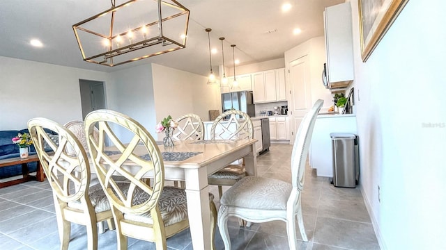 dining area featuring tile patterned floors