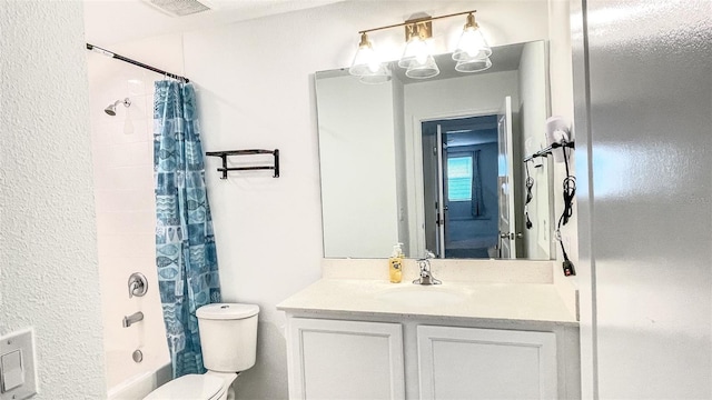 full bathroom with shower / bath combo, vanity, and toilet