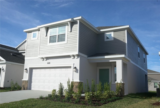 view of front of home featuring a garage