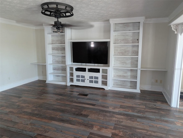 unfurnished living room with dark wood-type flooring, a textured ceiling, and ornamental molding