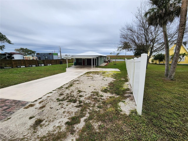 exterior space with a carport