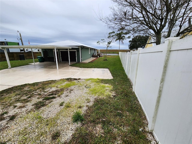 view of yard featuring a carport