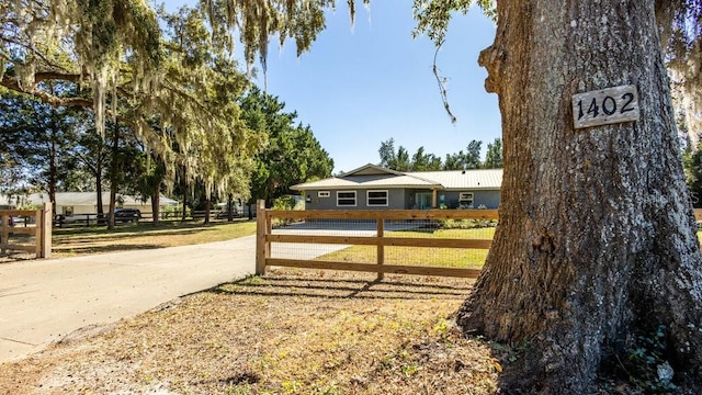 exterior space with a front yard