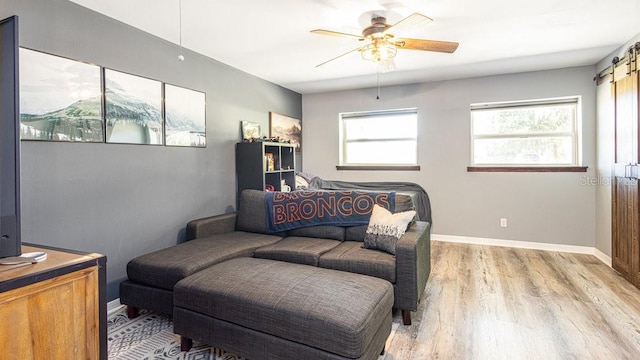 interior space with ceiling fan and light hardwood / wood-style floors