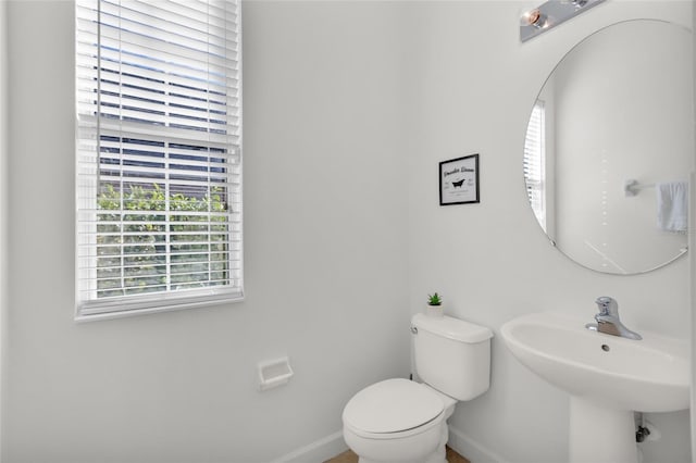 bathroom with sink and toilet