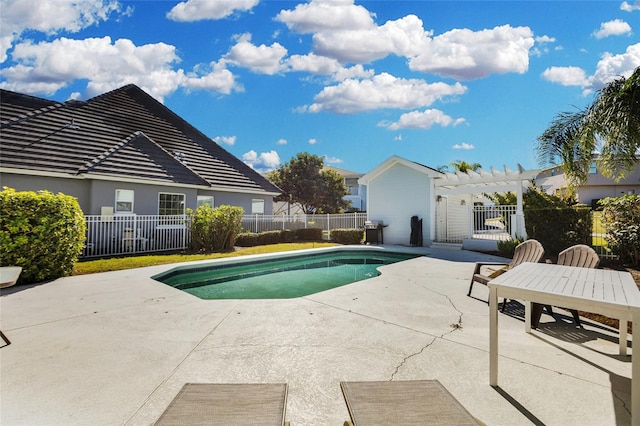 view of swimming pool featuring a pergola and a patio area