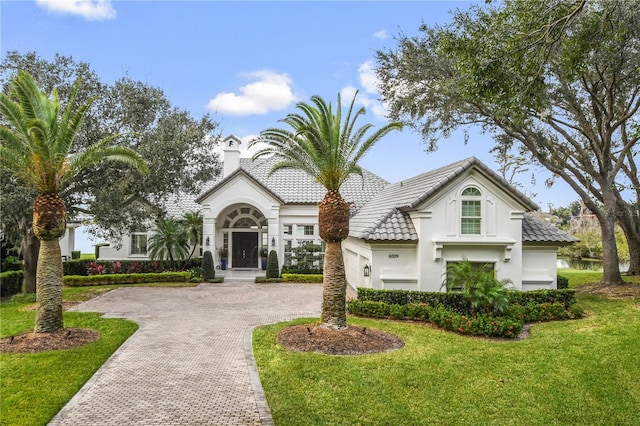 view of front facade with a front yard