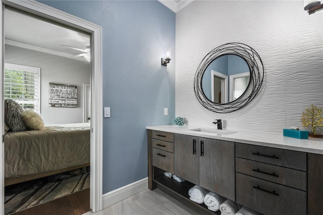 bathroom featuring vanity and crown molding