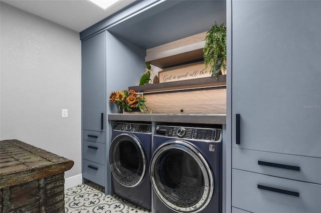 washroom with washer and dryer