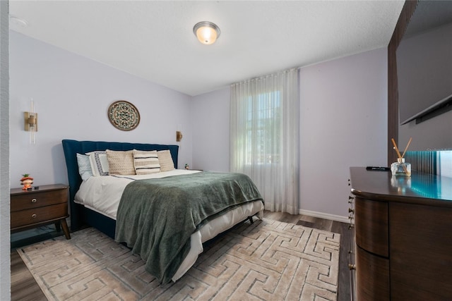 bedroom featuring light wood-type flooring