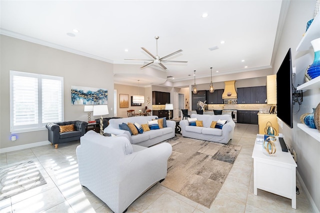 living room featuring ceiling fan, light tile patterned floors, and crown molding