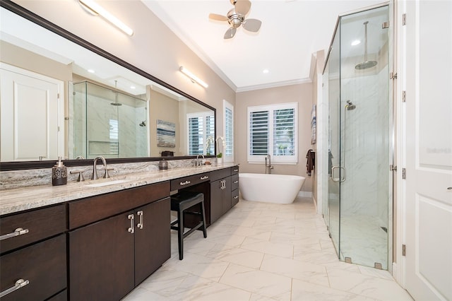 bathroom with ceiling fan, separate shower and tub, crown molding, and vanity