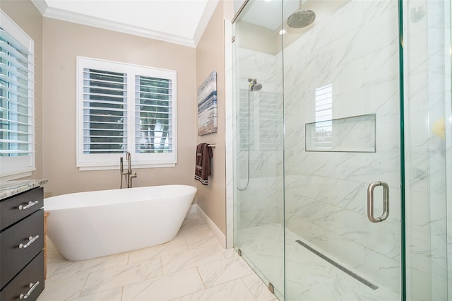 bathroom with plus walk in shower, vanity, and crown molding