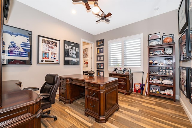 office area featuring ceiling fan and light hardwood / wood-style floors