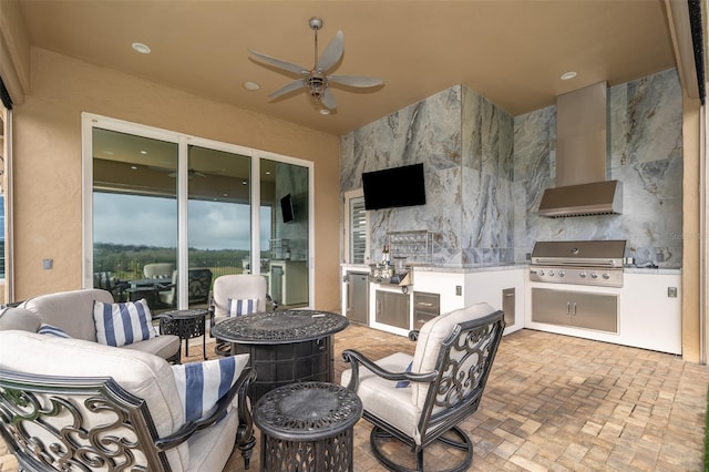 view of patio / terrace with a grill, ceiling fan, outdoor lounge area, and an outdoor kitchen