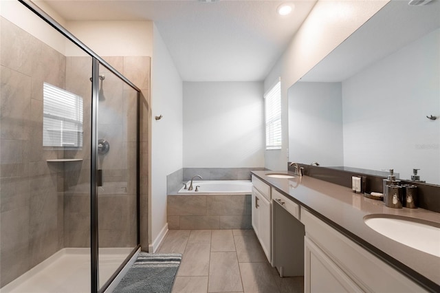 bathroom featuring separate shower and tub, tile patterned flooring, and vanity