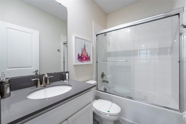 full bathroom with vanity, toilet, and enclosed tub / shower combo