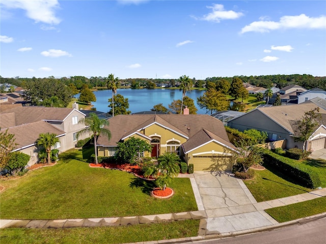 bird's eye view with a water view