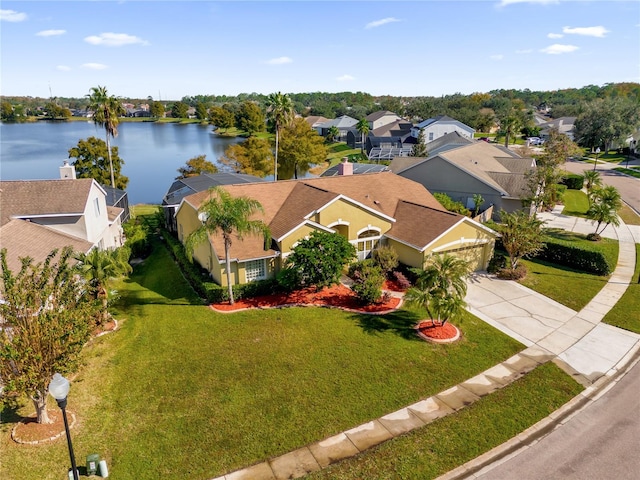 bird's eye view with a water view