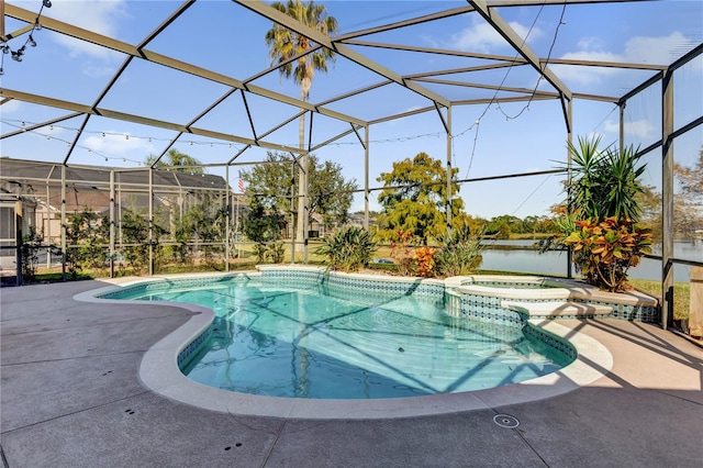 view of swimming pool featuring a lanai, an in ground hot tub, and a patio