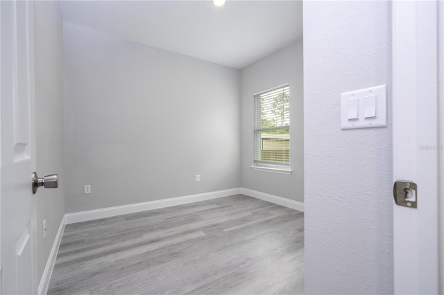 empty room featuring light hardwood / wood-style floors