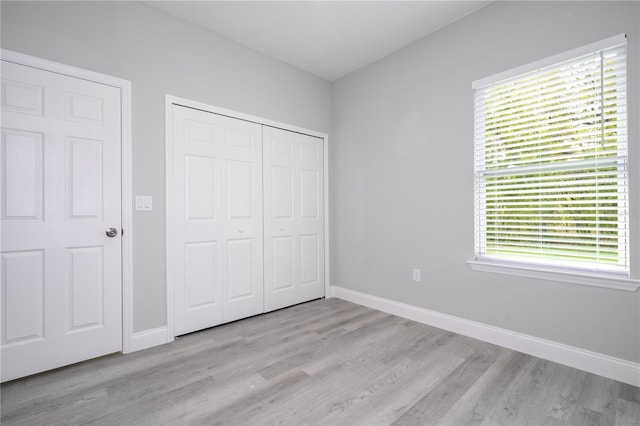 unfurnished bedroom featuring light hardwood / wood-style floors