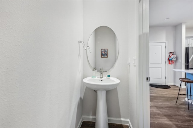 bathroom featuring hardwood / wood-style floors