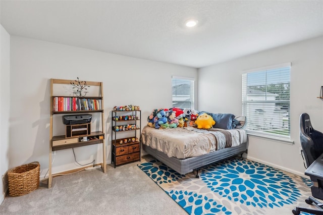 2920 Oak Park Way Apt A, Orlando, FL 32822 - bedroom with carpet flooring and baseboards