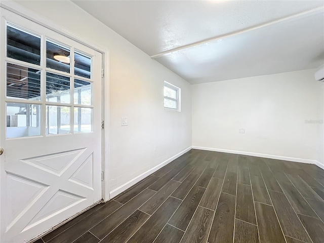 interior space with dark hardwood / wood-style flooring