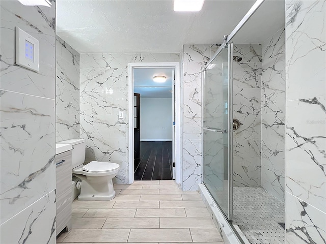 bathroom with toilet, tile walls, and walk in shower