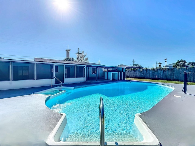 view of swimming pool with a patio