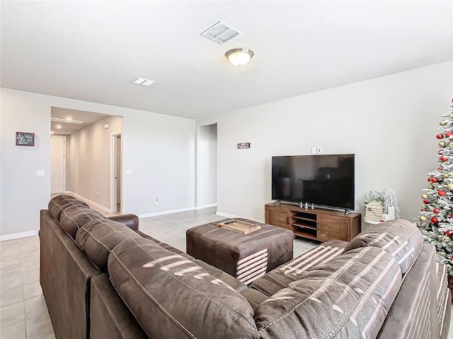 living room with light tile patterned flooring