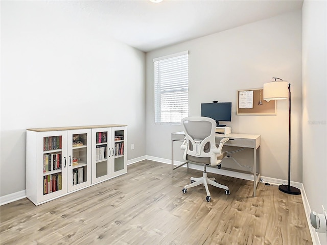 office with hardwood / wood-style floors