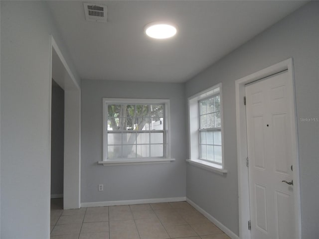 interior space featuring light tile patterned floors