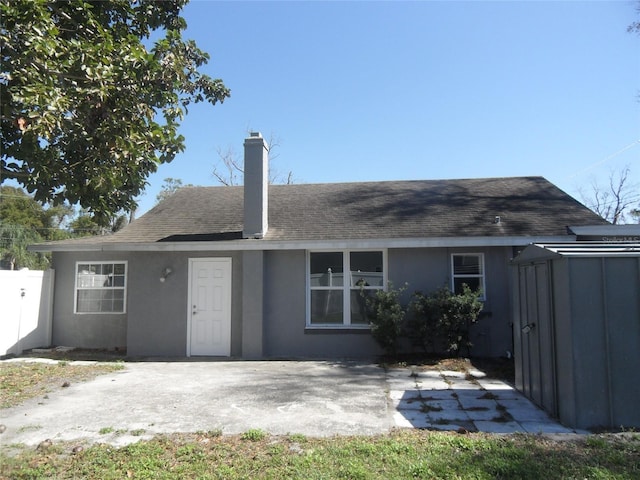 back of house featuring a patio area