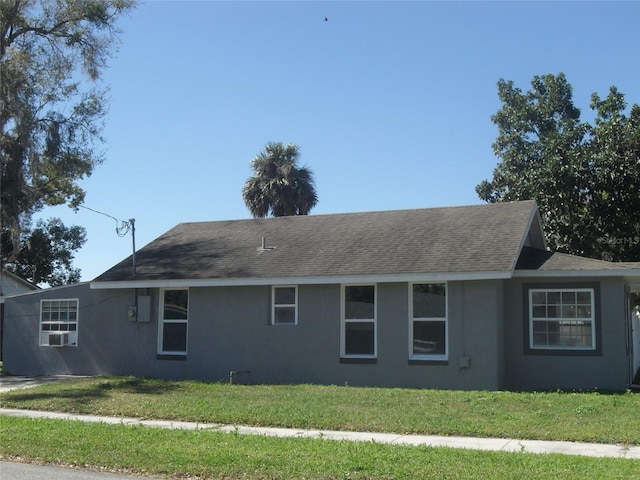 view of property exterior featuring a yard