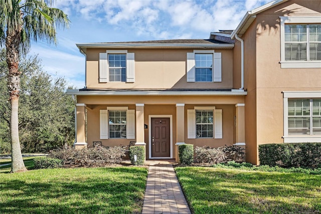 view of front of property with a front yard