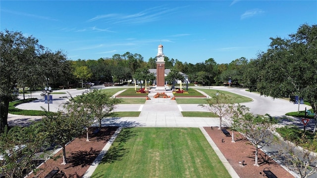 view of community featuring a lawn