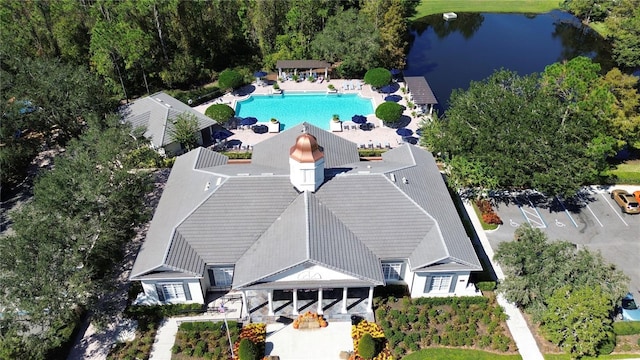 birds eye view of property featuring a water view