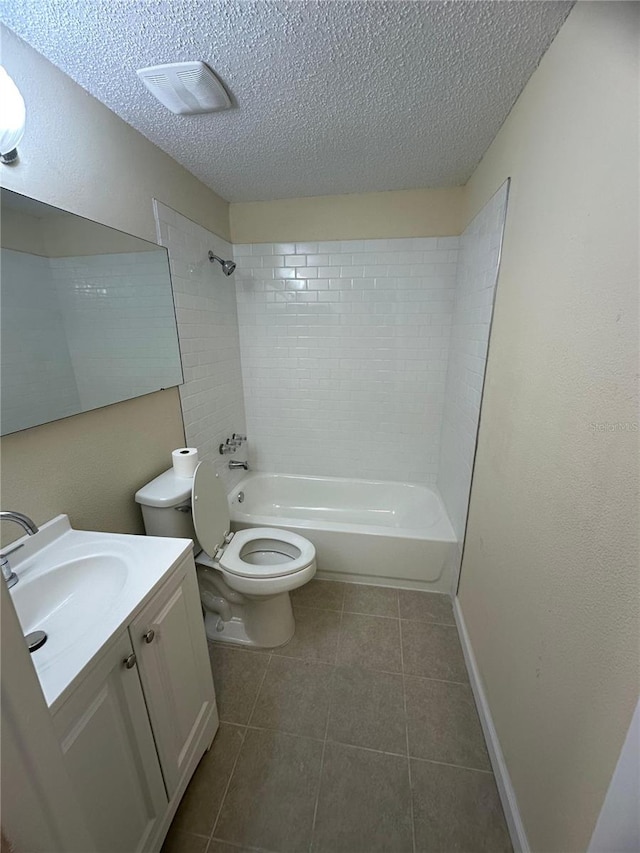 4944 Hazner St Unit 4944, New Port Richey, FL 34652 - bathroom with vanity, tile patterned flooring, a textured ceiling, and tub / shower combination