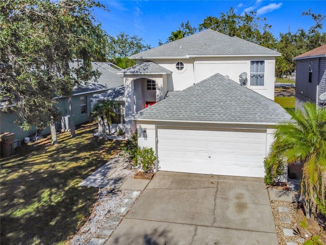 front of property featuring a garage