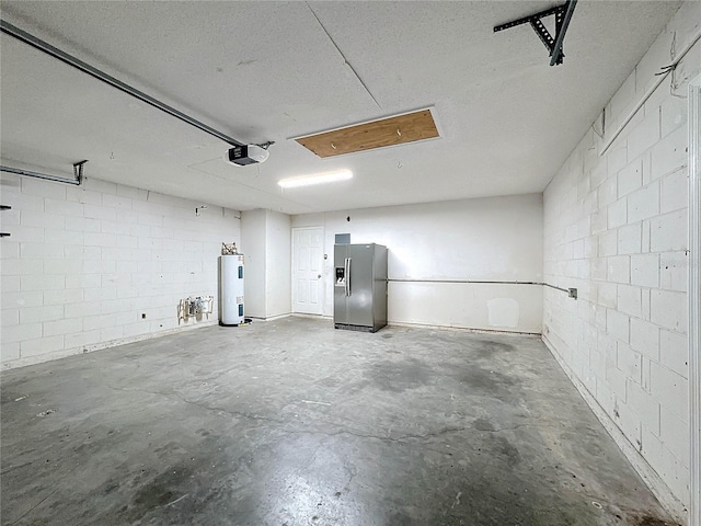 garage featuring stainless steel fridge with ice dispenser, electric water heater, and a garage door opener