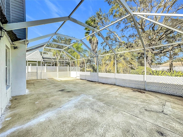 view of patio / terrace with glass enclosure