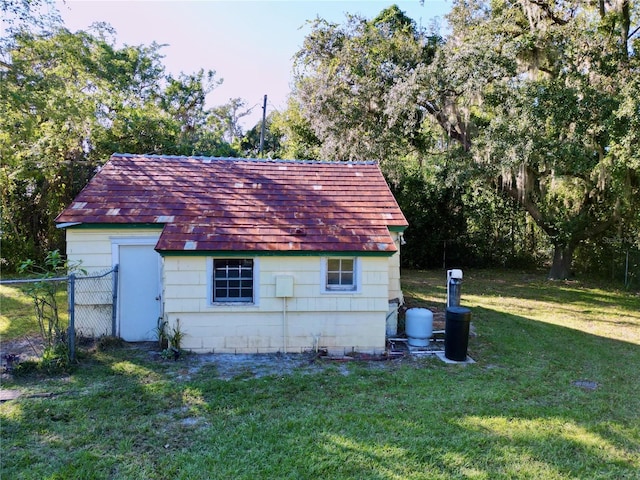 view of property exterior featuring a yard